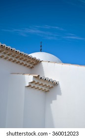 Architectural Detail Of The Church Of St. Anthony In Castro Marim, Showing Roof Tiles And Dome. Algarve, Portugal