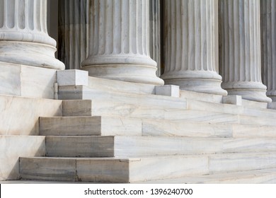 Architectural detail of marble steps and ionic order columns
