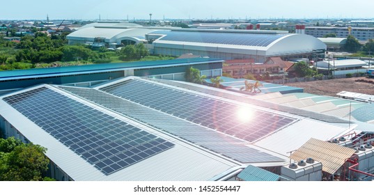 Architectural detail of metal roofing on commercial construction Solar panels or Solar cells on factory rooftop or terrace with sun light, Industry.