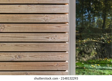 Architectural Detail On The Fragment Of The Elevation Of The Single Family House Made Of Wood. Visible Fragment With Window Joinery.