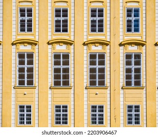 Architectural Detail With The Windows Of An Old Building. Old Vintage Architecture In The Center Of  Prague, Czech Republic. Seamless Pattern Background