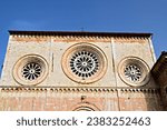Architectural details of the external facade of the Abbey of San Pietro in Assisi, Umbria, Italy