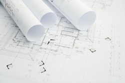 architectural drawing paper rolls of a dwelling for construction, an Industrial Photo by WorldWide