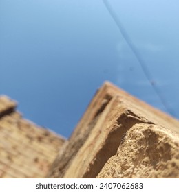 Architectural elegance in a close-up: captivating bricks with textured tales.
