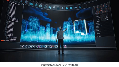Architectural Engineer in a VR Headset Designs Futuristic Cityscapes on a Big Panoramic Digital Screen. 3D Render Shows Buildings Made with Polygon Mesh. Virtual Reality Technology Innovation Concept