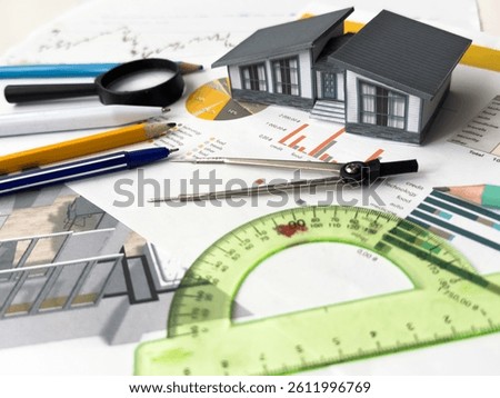 Architectural engineering design plan drawing on the table. Architect's work on table in studio. Construction design and plan