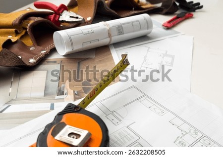 Architectural engineering design plan drawing on the table. Architect's work on table in studio. Construction design and plan