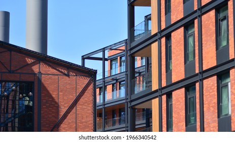 Architectural exterior detail of residential apartment building with brick facade. Modern brick and glass facade of the apartment building. - Powered by Shutterstock