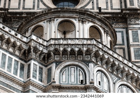 An architectural fragment of the majestic building of the Cathedral of Santa Maria Del Fiore, which is an undisputed masterpiece of sacred architecture on a global scale. Florence, Italy.

