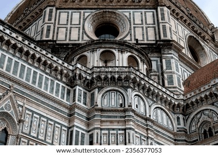 An architectural fragment of the majestic building of the Cathedral of Santa Maria Del Fiore, which is an undisputed masterpiece of sacred architecture on a global scale. Florence, Italy.
