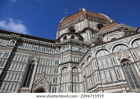 An architectural fragment of the majestic building of the Cathedral of Santa Maria del Fiore, an undisputed masterpiece of sacred architecture on a world scale. Florence, Italy.
