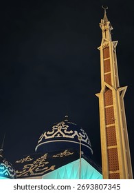 An architectural marvel, the mosque features slender minarets crowned with golden crescents and a captivating dome.
