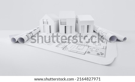 architectural model of houses on blueprint draw, isolated on white background, banner layout with copy space for building construction plan or real estate sale, Image usable for concept of bank loan