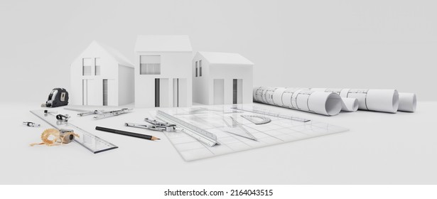 architectural model of houses on desk with drawing technical tools and blueprint rolls, isolated on white background, for building construction plan, interior designer and architect work concept - Powered by Shutterstock