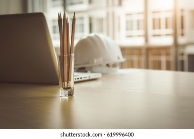 Architectural Office desk background construction project ideas concept  With drawing equipment and mining light