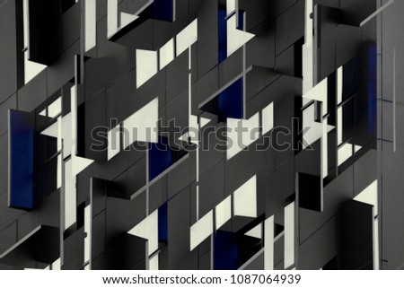 Architectural planes. Reworked photo of windows in shades of metallic gray color with blue inclusions. Abstract modern architecture image in constructivism or cubism style.