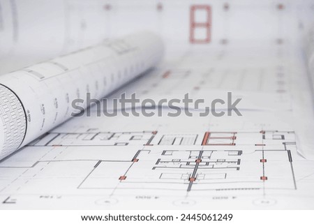 Architectural project in rolled-up construction and technical drawings