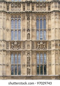 Architectural Stonemasonry Detail With Stained Glass Windows.