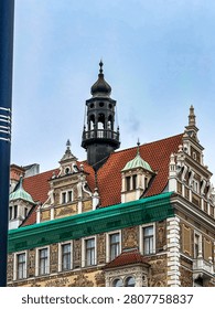 Architectural view of a building, showcasing structural design, facade details, and urban architectural style in a European city setting.