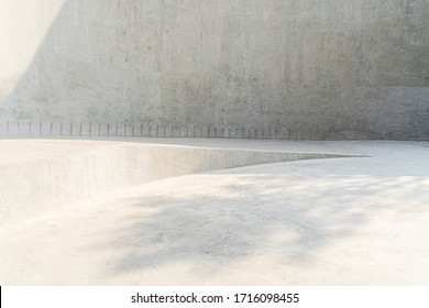 Architecture backdrop, grey concrete texture wall and floor outdoor with shadow from sunlight. Abstract backdrop.