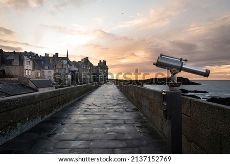 Architecture of the city of Saint Malo in Brittany in France under a sunset