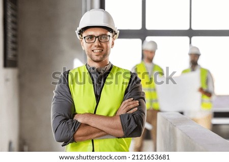 Similar – Workers working in the construction site to build a house