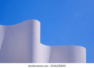 Architecture Curve Facade Building in Minimal Design Background, Modern White Concrete Exterior wall against Blue Clear Sky, Abstract House Architectural Decoration Backdrop in Street Style 