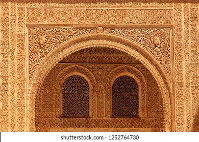 Architecture detail of Alhambra palace in Granada - South of Spain. 600 years old arabic characters.