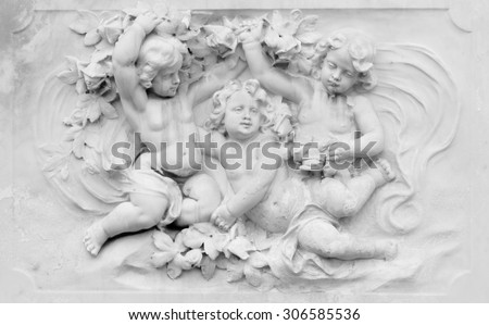 Architecture detail of basrelief with cherubs