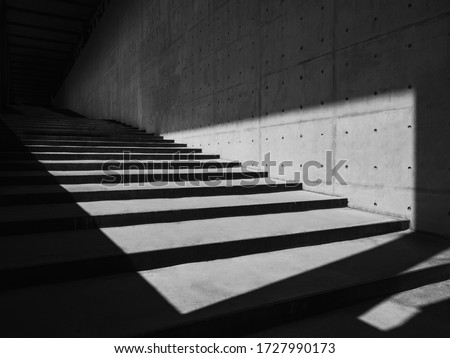 Architecture details Cement concrete wall stairs Modern building shade and shadow lighting