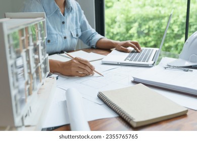 Architecture drawing on architectural Creative project business architecture building construction Industrial engineering Achievement Planning Design on blueprint eco Concept - Powered by Shutterstock