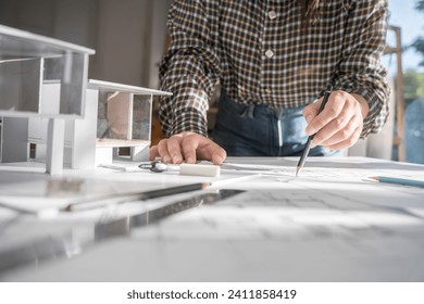 Architecture drawing on architectural Creative project business architecture building construction Industrial engineering Achievement Planning Design on blueprint eco Concept.   - Powered by Shutterstock