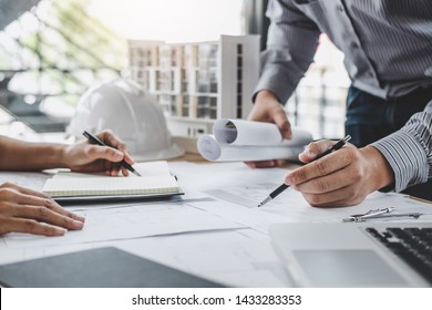 Architecture Engineer Teamwork Meeting, Drawing and working for architectural project and engineering tools on workplace, concept of worksite on technical drawing structure and construction.