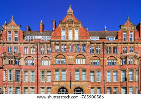 Architecture, facade of an old red brick mansion in London