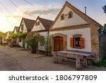 architecture of the Hajos Baja wine region which is famous for the museal colorful cellar village of Hajos with 1200 little cellars in sunset.