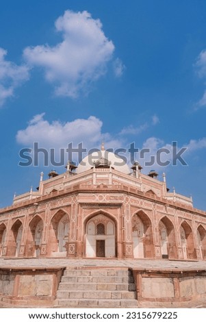 the architecture of Humayun's Tomb and the blue sky. Humayun's tomb is the tomb of the Mughal Emperor Humayun in Delhi, India.