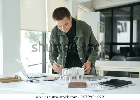 Architecture interior Man Creative project plan designer home and Choose interior materials  drawing interior on blueprint 