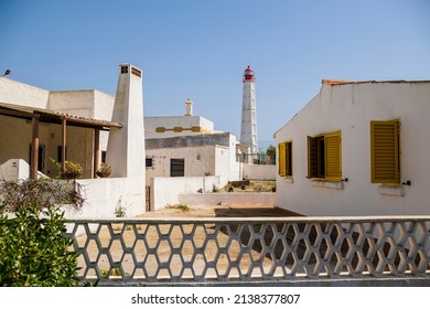 Architecture and lighthouse at Farol Island, Faro District, Algarve, Portugal