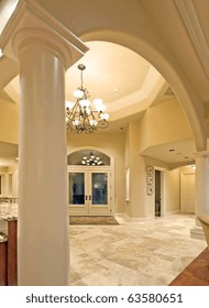 Archway And Entryway In Luxurious New Home