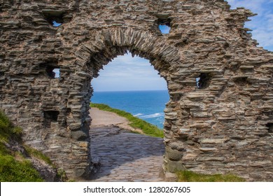 An Archway At Tintagel Castle, Birth Place Of King Arthur With Coastal Views.