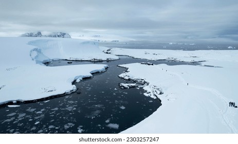 Arctic, Antarctica, Drone, Fly Over, Beach, Polar Region, Climate Change, Global Warming, Landscape, Mountain Range, Ocean, Ice, Icebergs, Tourists, Tourism, Science Station, Travel, Adventure.