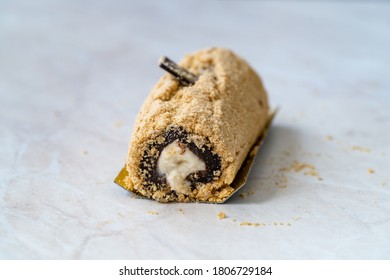 Arctic Cake Milky Roll Dessert With Biscuit Powder And Banana.
