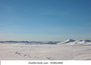 The Arctic Landscape. Snow Plain And The Sky.