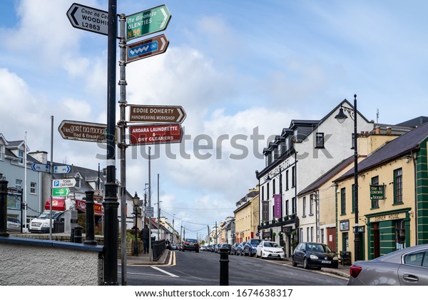 ARDARA, COUNTY DONEGAL /\
IRELAND - MARCH 13 2020 : Ardara town is still busy during the\
Corona outbreak.