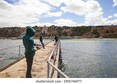 ARDROSSAN, YORKE PENINSULAR, JANUARY 2021; People fishing from the jetty at Ardrossan, Yorke Peninsula, South Australia