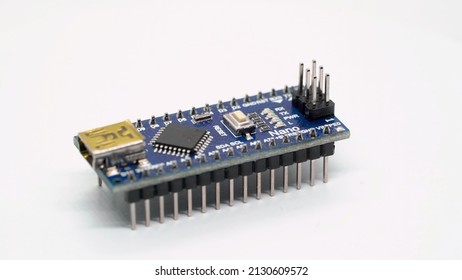 Arduino nano electronic component. Small single board computer, device for study at white isolated. Electronics diy robotics chip microcontroller board.