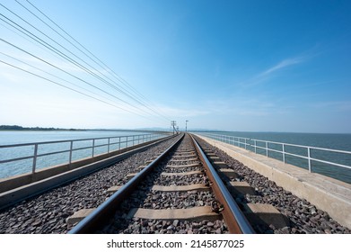 Area of Railroad tracks with floating railway bridge over water reservoir at Pa Sak Cholasit Dam, Lopburi, Thailand.