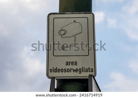 area videosorvegliata italian text means CCTV site under video surveillance protected sign in italy city