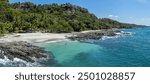 Areal drone view of Montezuma tropical beach in Nicoya Peninsula, in Costa Rica, central America