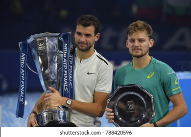 Arena O2, London, UK – November 19, 2017: Bulgaria’s Grigor Dimitrov celebrates his biggest title in career - No.1 beside Belgium’s David Goffin - No.2 of Nitto ATP Finals at O2 indoor Arena, London